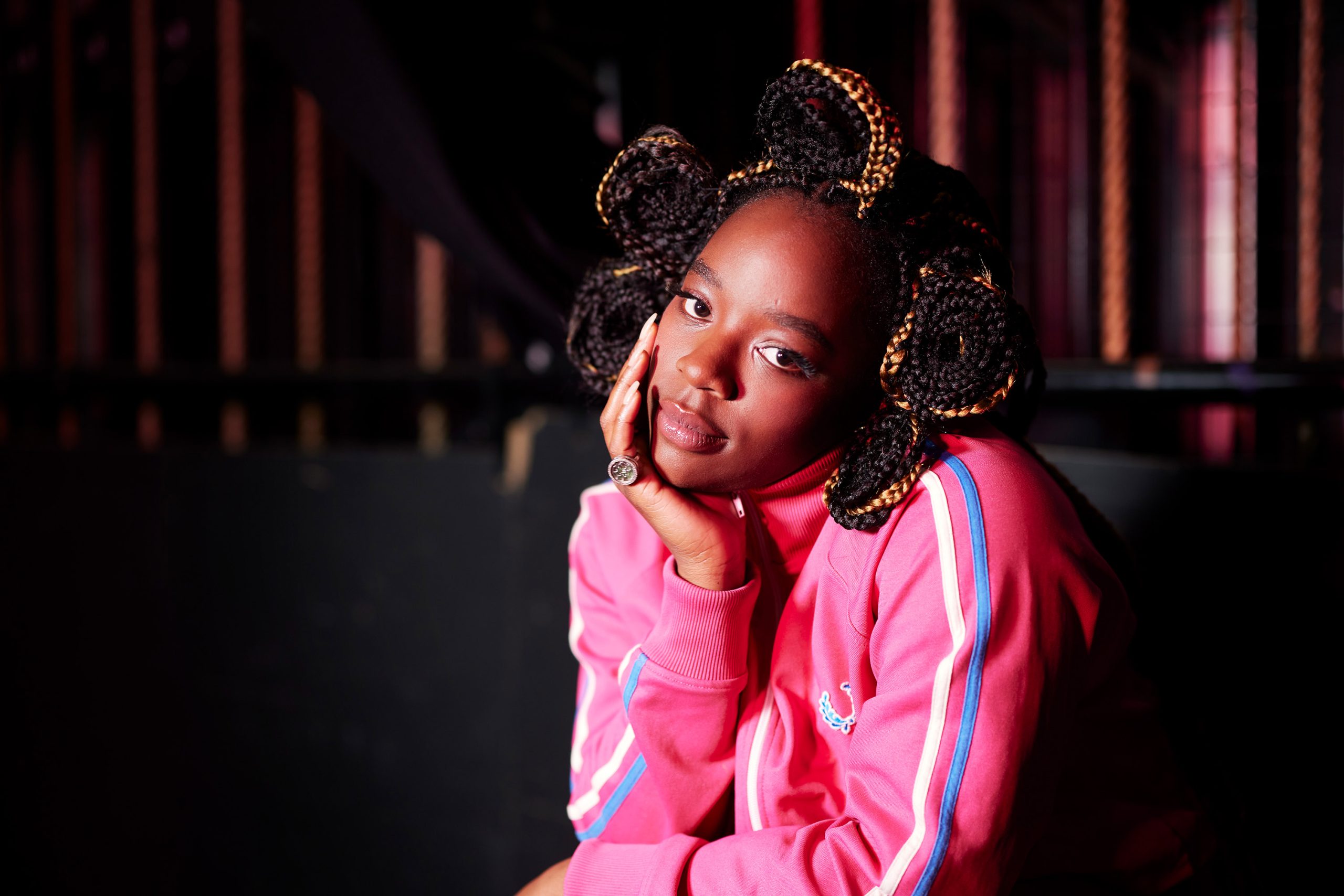 Corrina leaning on her hand