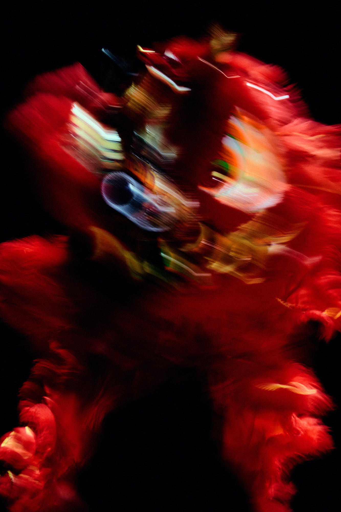 An out of focus image of a LION item in red